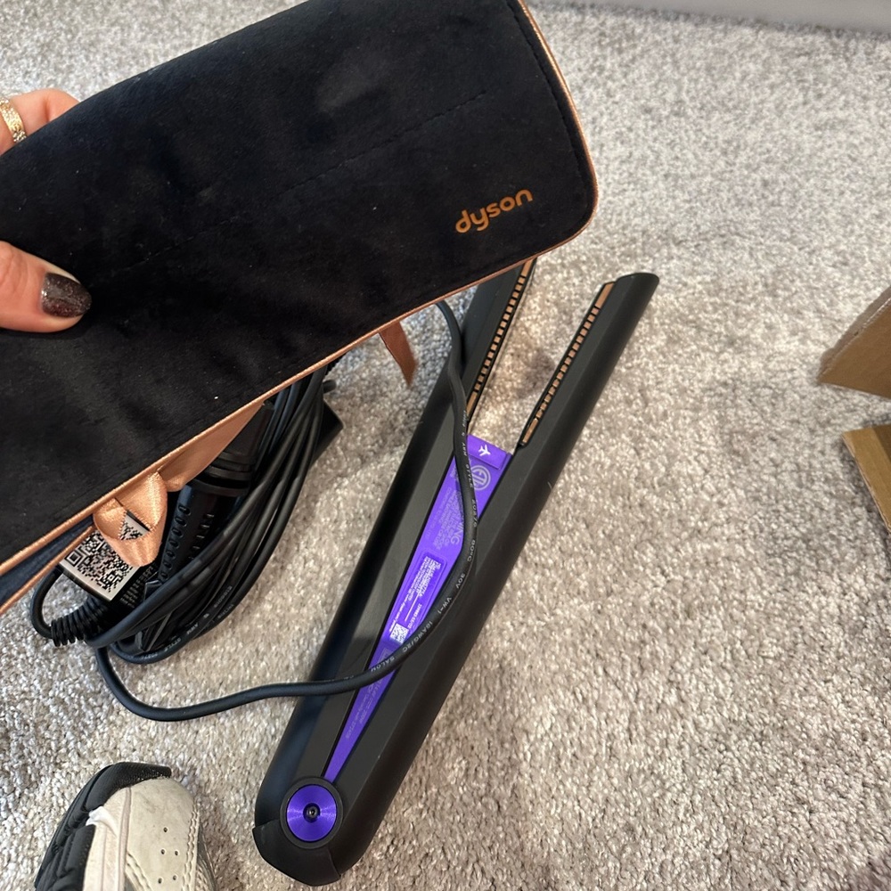 Brand new never used Dyson hair straightener.